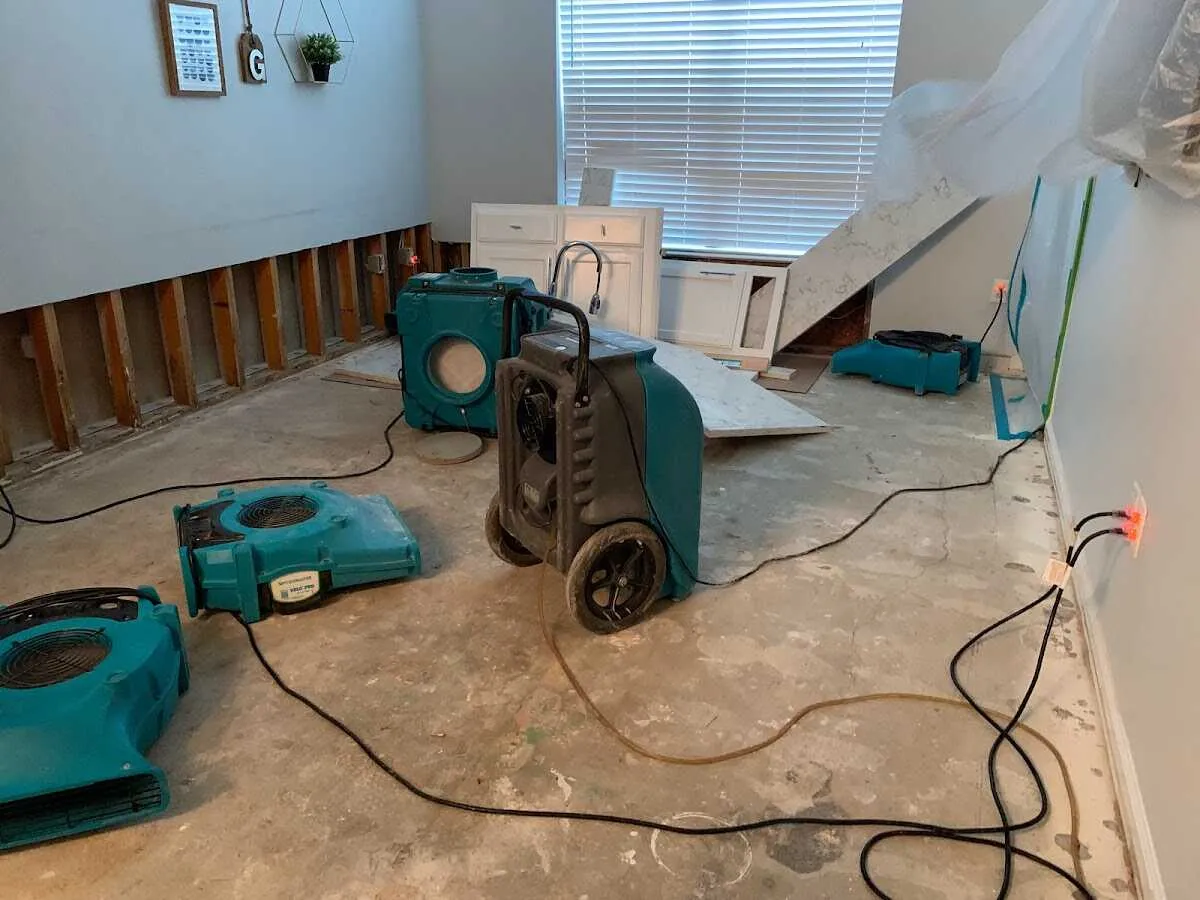 Dehumidifier in flood-cut room for Water Damage Restoration in Crete